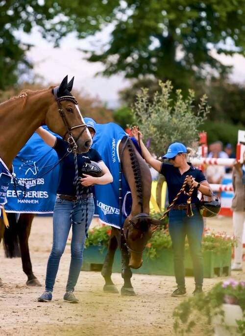 The grooms of the winning German team at Mannheim play a vital role in the success of their horses, monitoring every detail and knowing them inside out as they prepare to compete. © EEF