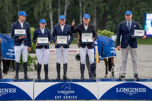 The Norwegian team celebrate their victory atop of the podium at the Longines EEF Series CSIO3* Drammen qualifier on Friday 12 June 2026. L to R: Johan-Sebastian Gulliksen, Mira Oliva Høidal, Pål Flam, Geir Gulliksen and Chef d'Equipe: Mikael Kolind © EEF/ Kristian Strøm