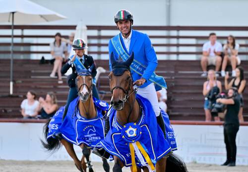 Roberto Turchetto with his mount Je Suis Godot d’Acheronte leads the victory lap with Giulia Martinengo Marquet and Captain Morgan Weering Z close behind as they celebrate their incredible Longines EEF Series semi-final win in Budapest on Friday 27 June 2025.  © EEF/ photohajdu.
