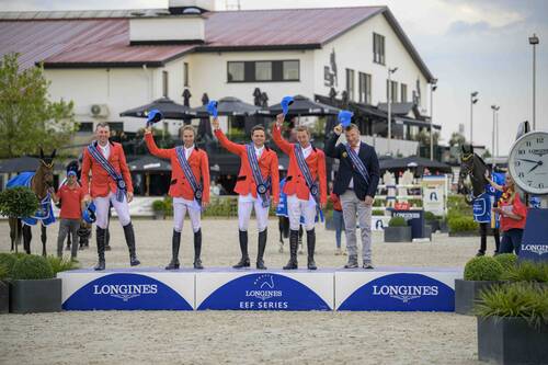 Team Belgium salute the home crowd from the podium as they celebrate their victory in Lier (BEL). © EEF