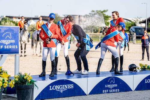Image: Team Switzerland celebrate a champagne victory on the podium in Bratislava at the Longines EEF Series Nations Cup on Friday 13 June 2025. L to R: Gaetan Joliat, Anthony Bourquard, Chef d’equipe Peter van der Waaij, Barbara Schnieper and Martin Fuchs © EEF/ Jan Vlcek @equifo.cz